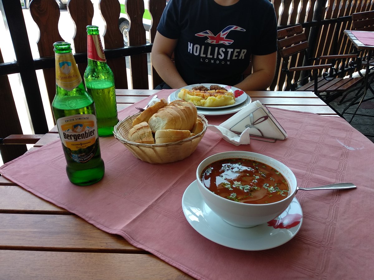 Having romanian soup in an authentic restaurant
